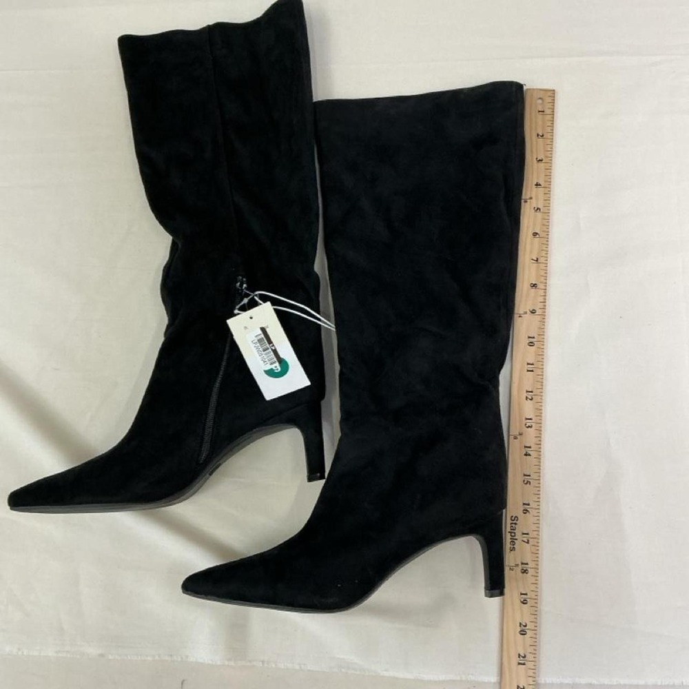 A New Day black over-the-knee boots featuring a sleek pointed toe silhouette